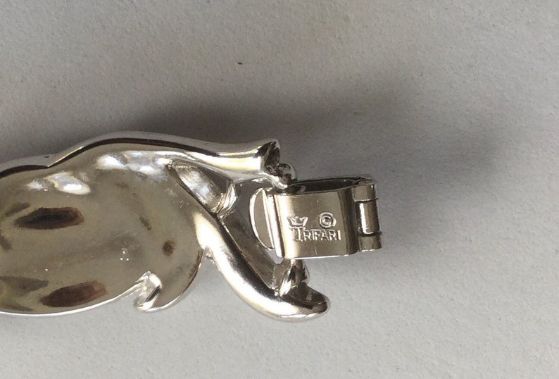 Crown and copyright mark on clasp